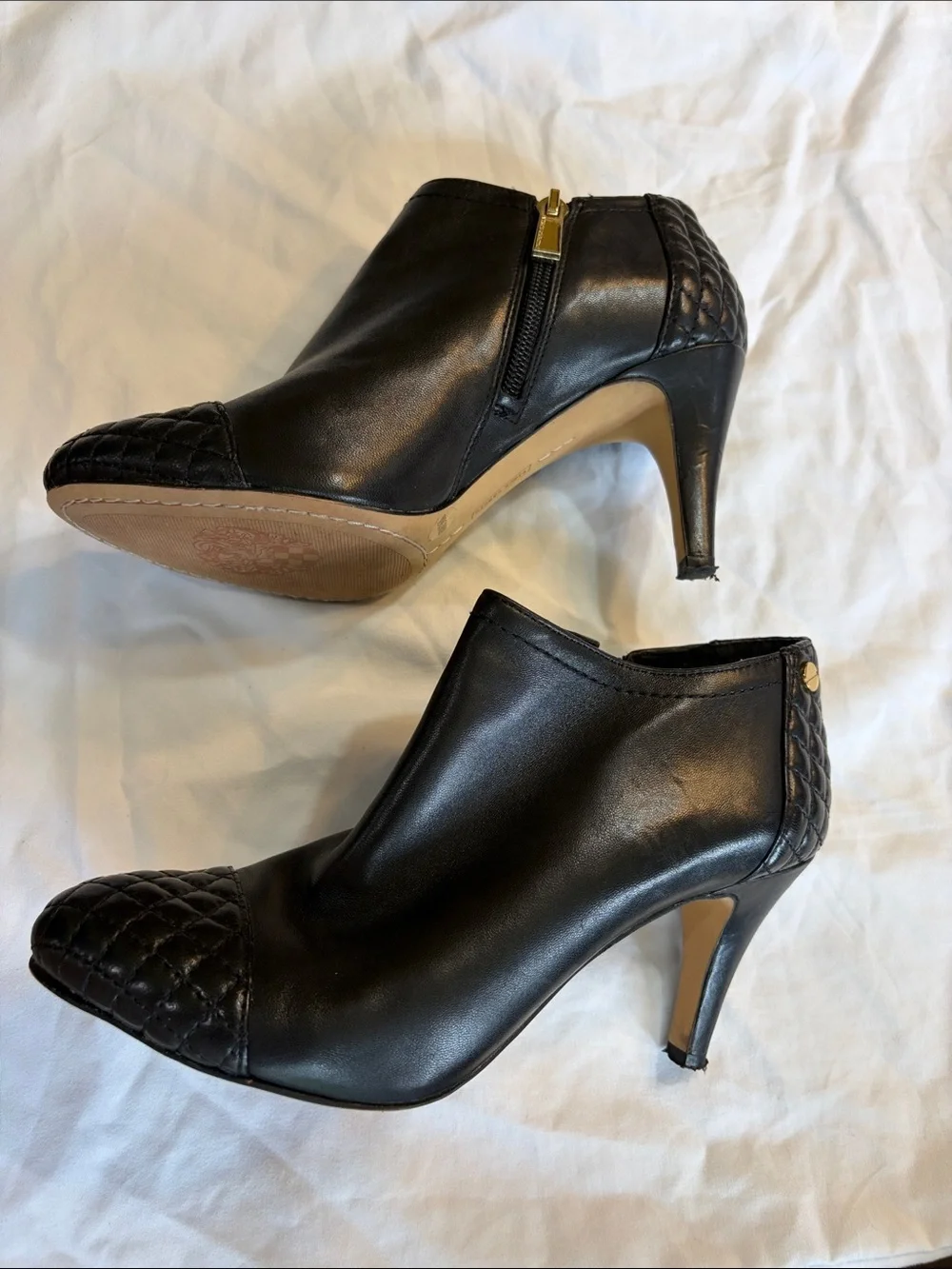 Vince Camuto Black Quilted Cap-Toe Leather Ankle Booties with Gold Zipper